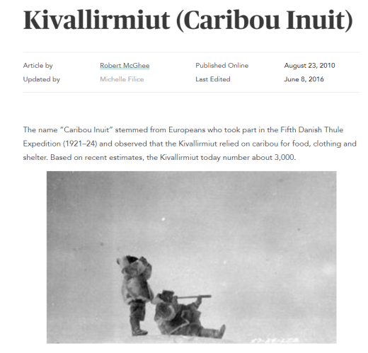 Two Inuit hunters looking into the distance 