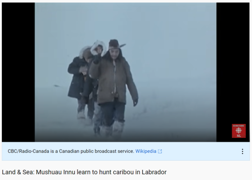 Image of three hunters walking in a snowy environment